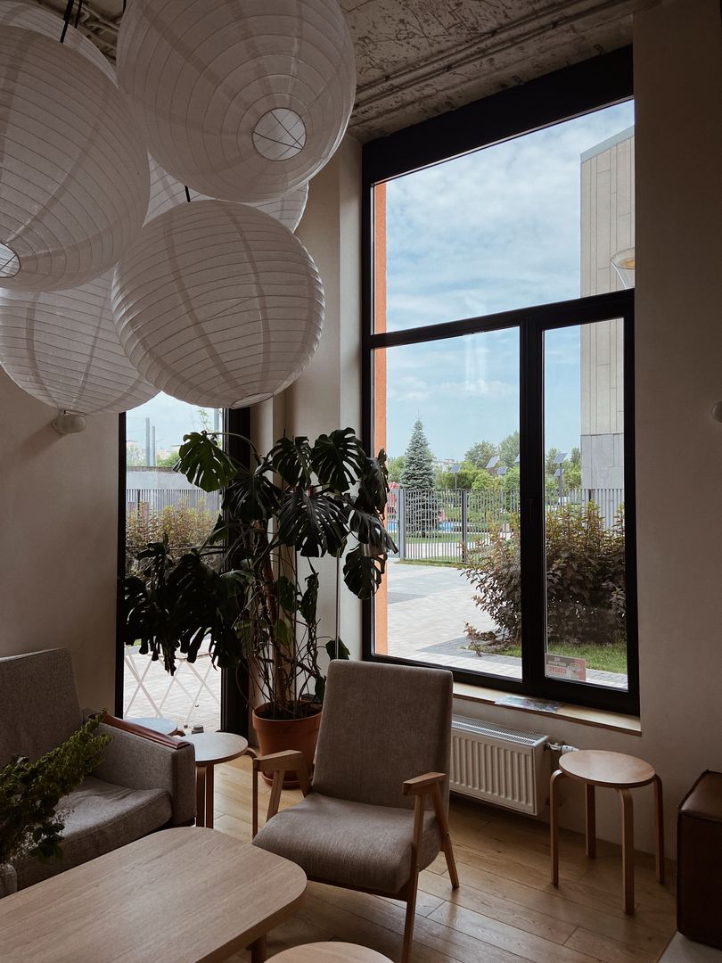 Warm, plant-filled therapy space with natural light